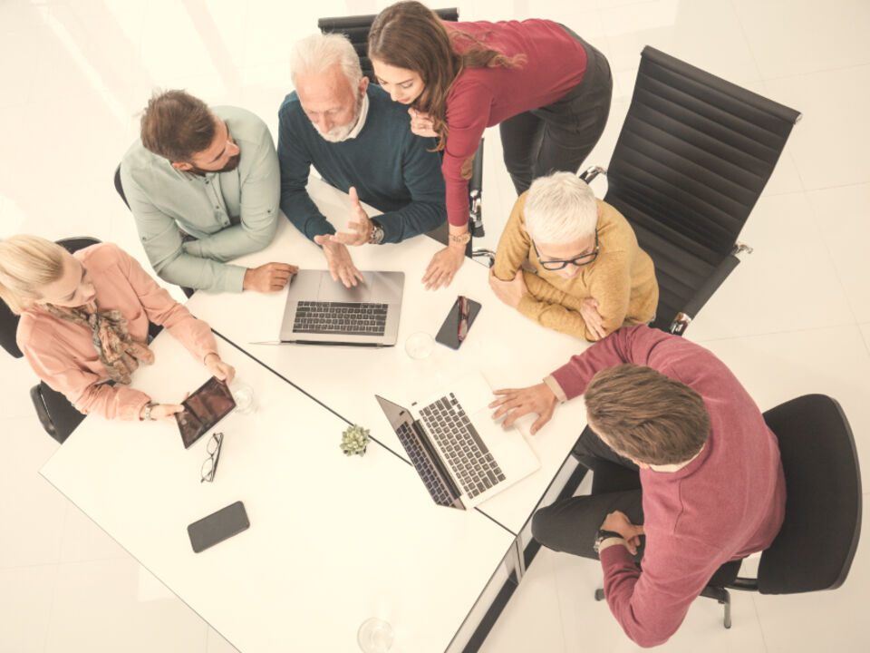 A team working together around a table